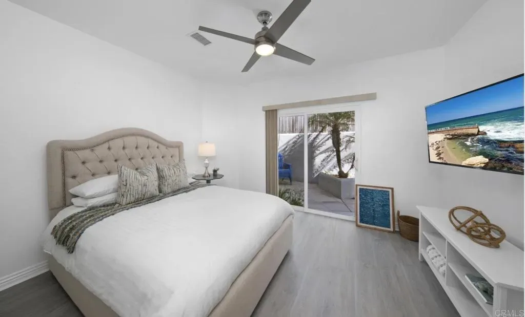Ground-floor bedroom with slider out to the private patio